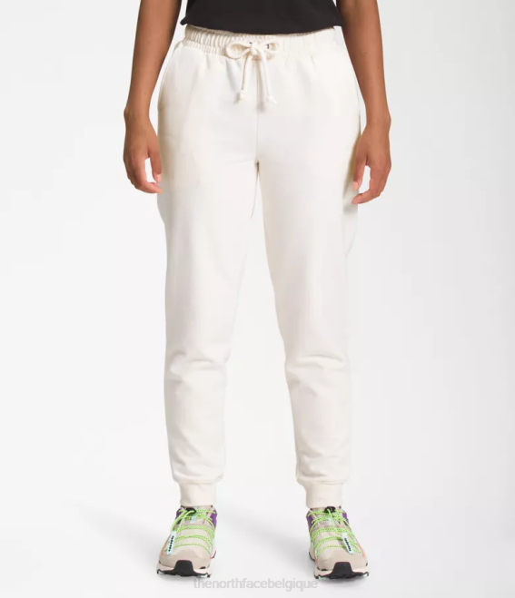 gardénia blanc femmes The North Face pantalon de jogging à écusson Heritage 62XR333