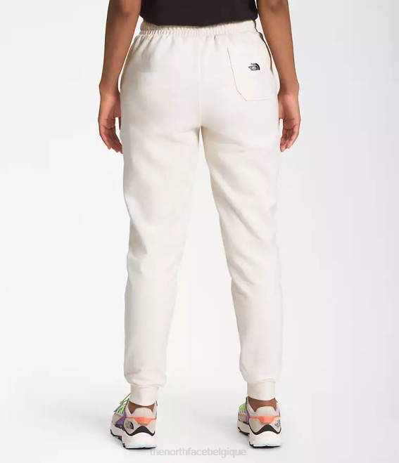 gardénia blanc femmes The North Face pantalon de jogging à écusson Heritage 62XR333