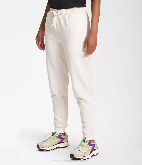 gardénia blanc femmes The North Face pantalon de jogging à écusson Heritage 62XR333